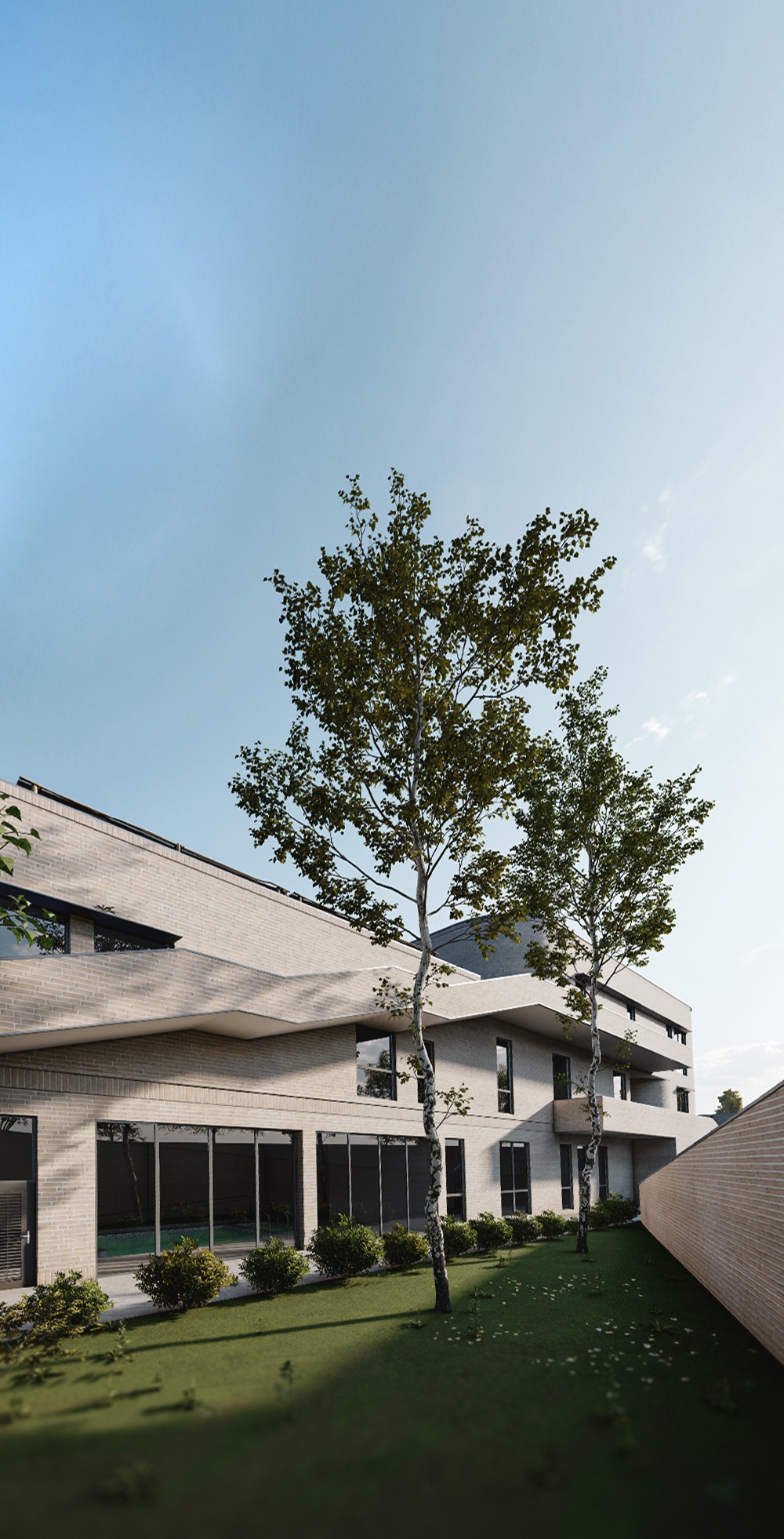 Saqqez Autism Center — Western façade and landscaped edge